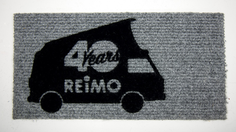 Купить онлайн Придверный коврик "40 лет Реймо"